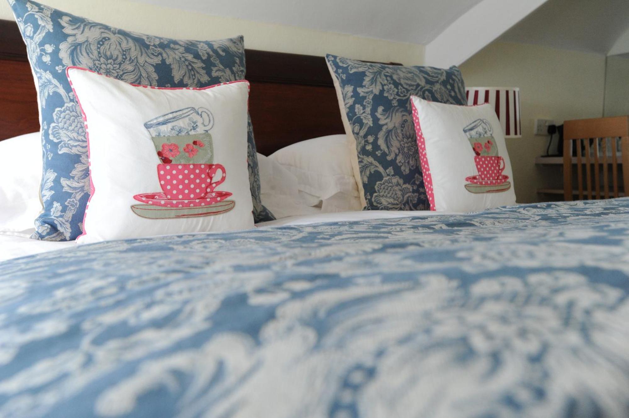 Hotel Anacapri Falmouth Pokoj fotografie A bed with a duvet